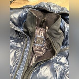 Sam kids size 8 winter coat like new. Barely worn. With hood. Navy blue